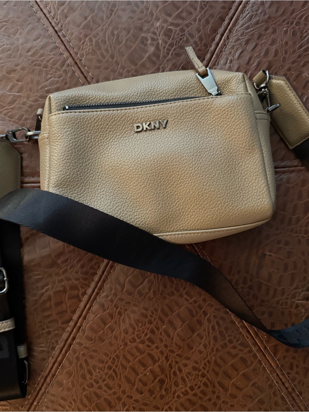 DKNY Pebbled Leather Crossbody Bag in Beige Tan with Black Strap. Good Condition